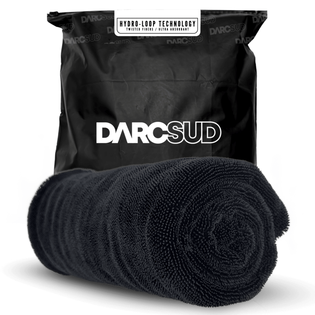 DARCSUD HydroLoop car drying towel rolled in front of black branded packaging with Hydro-Loop Technology label